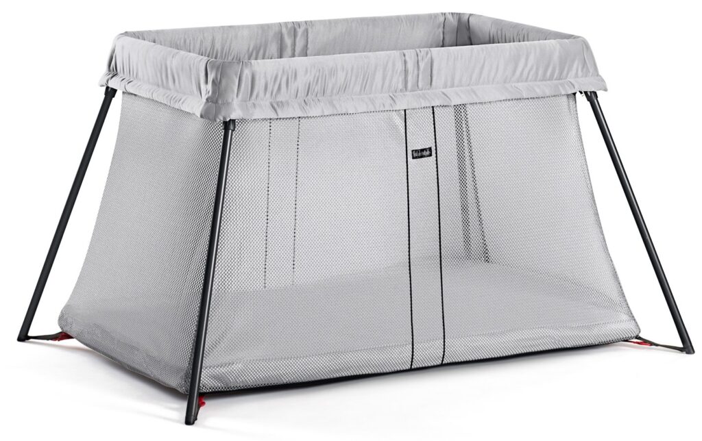 Best Travel Crib for Toddlers in 2026 BabyBjorn Travel Crib Light in silver mesh with a black frame, shown fully assembled on a white background.