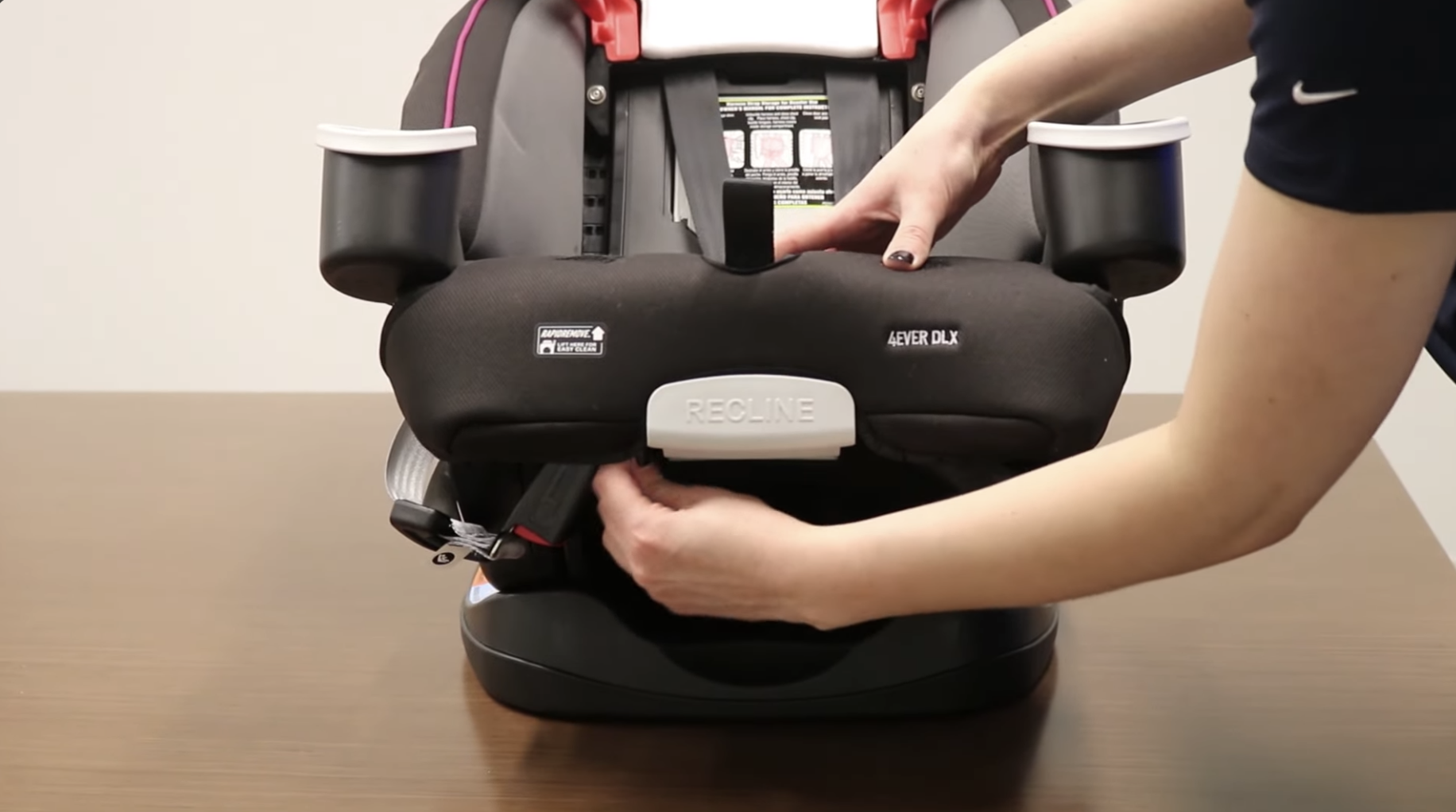 Close-up of RapidRemove tab release points on the seat shell