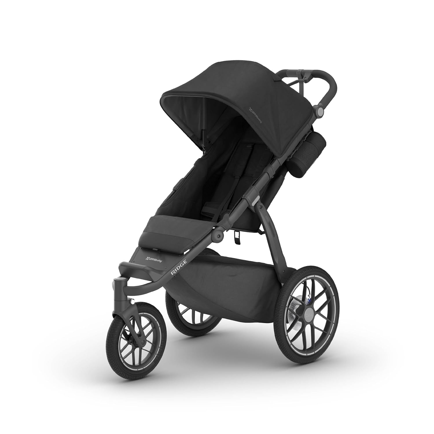 UPPAbaby Ridge foam-filled Kenda tires on a packed gravel trail